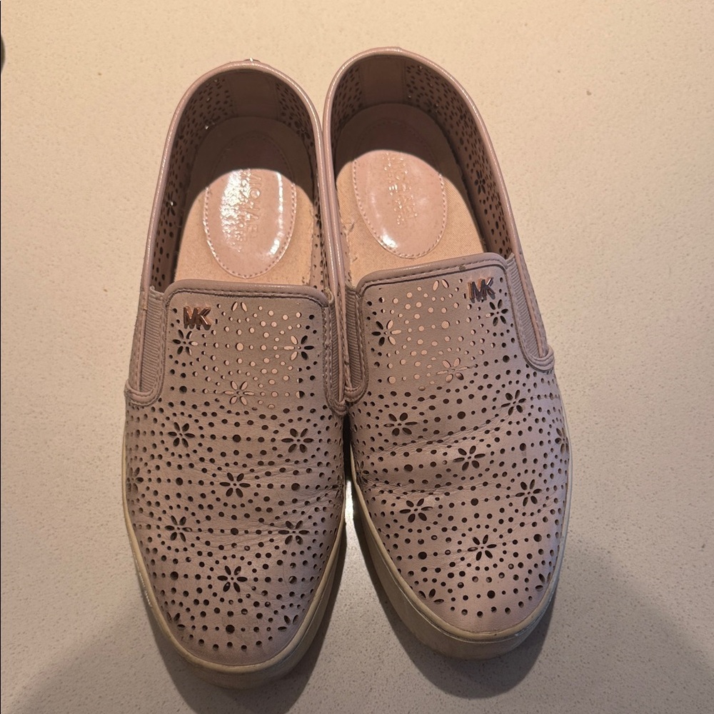 Pink slip-on Michael Kors sneakers